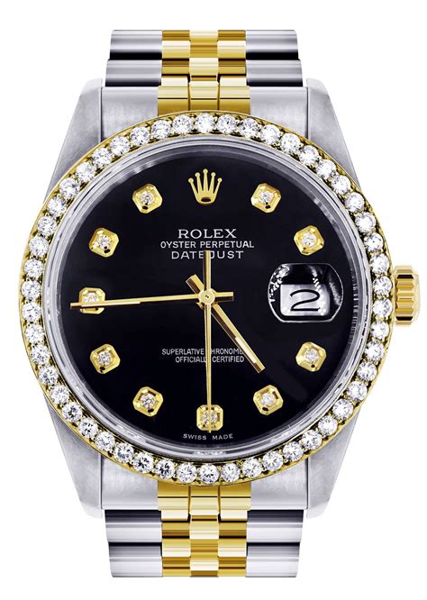 gold and silver rolex black face